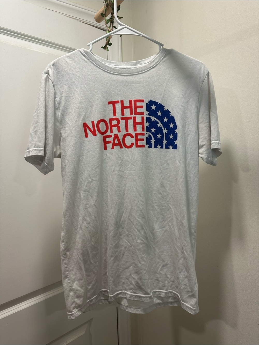 The North Face White Short Sleeve Tee with Red Logo & Blue Star Graphic / imperf
